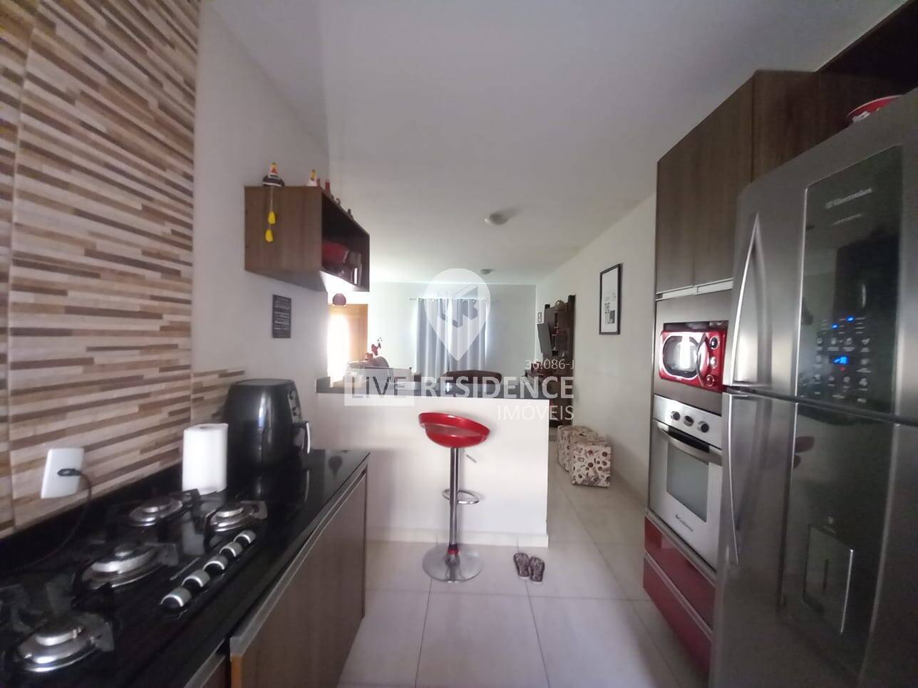 Casa com 3 dormitórios, sendo 1 suíte, no Villagio Fosuzzi
