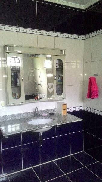 Casa à venda com 3 quartos, 307m² - Foto 7